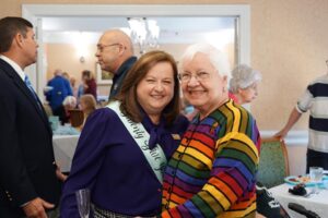 Director Diane Gouhin posing with a resident