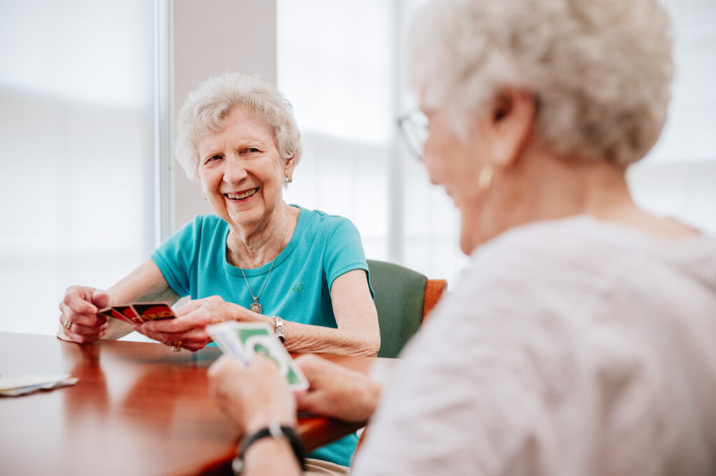 Residents playing Uno at the common area