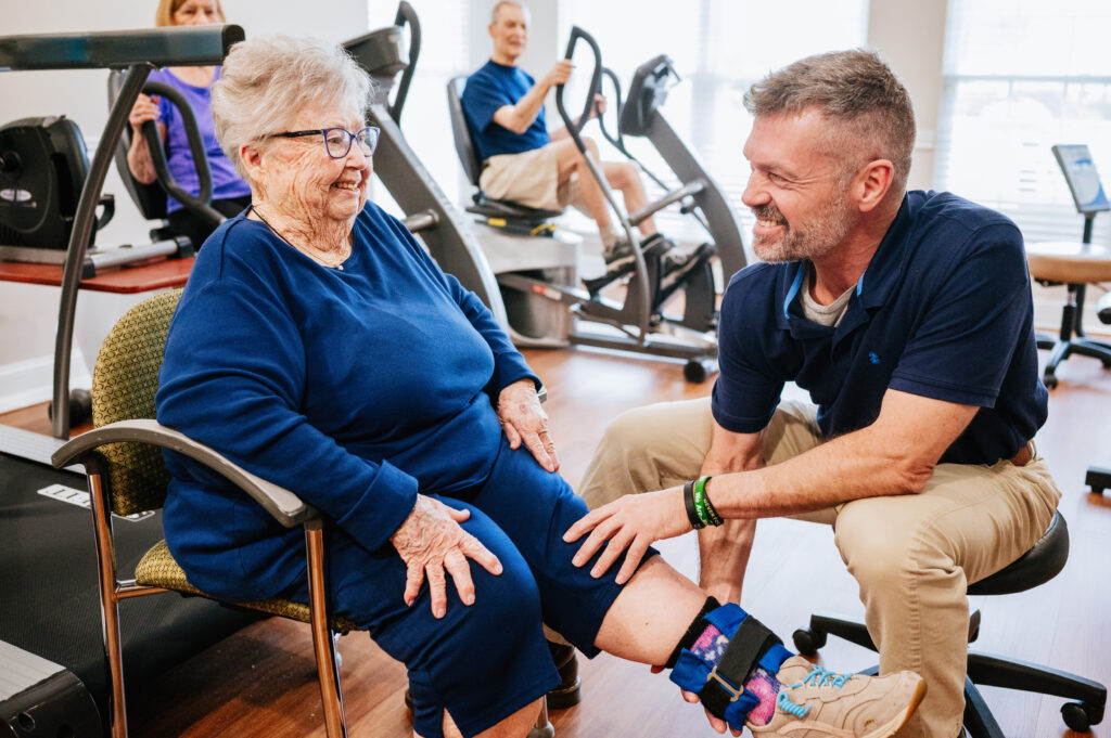 Physical Therapist with client