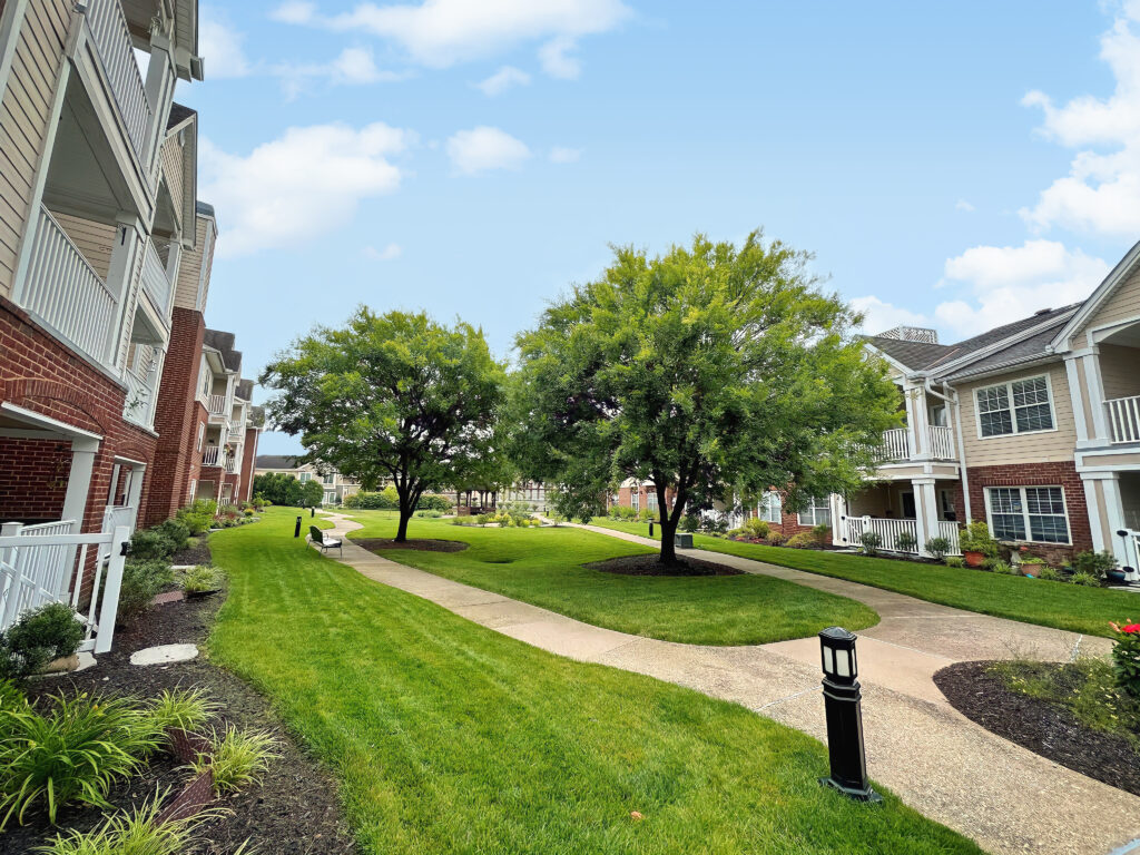 Edgewood Summit Exterior with lawn and walkway