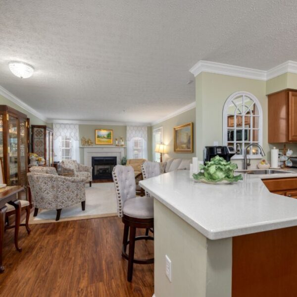 Sample living room and kitchen of apartment at Edgewood Summit