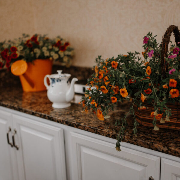 Flowers displayed on the counter at the fashion show