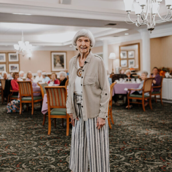 Model posing for the camera at the fashion show