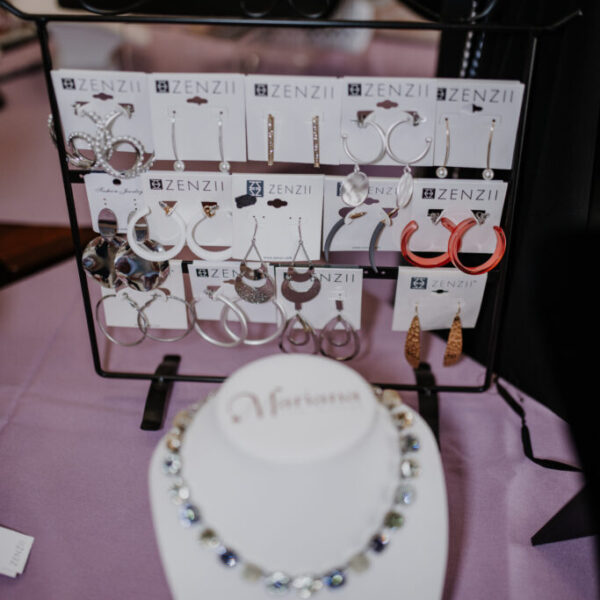 Earrings and a necklace displayed for the fashion show