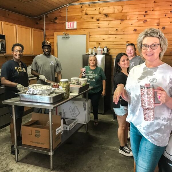 Staff members preparing lunch for the picnic for residents