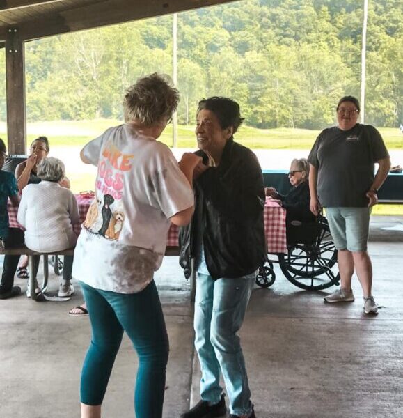 Residents dancing and enjoying their time at the picnic