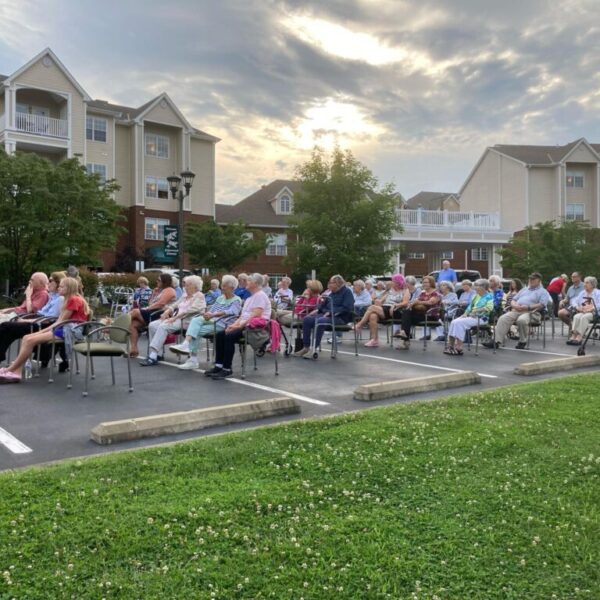 Residents and their family watching the summer concert