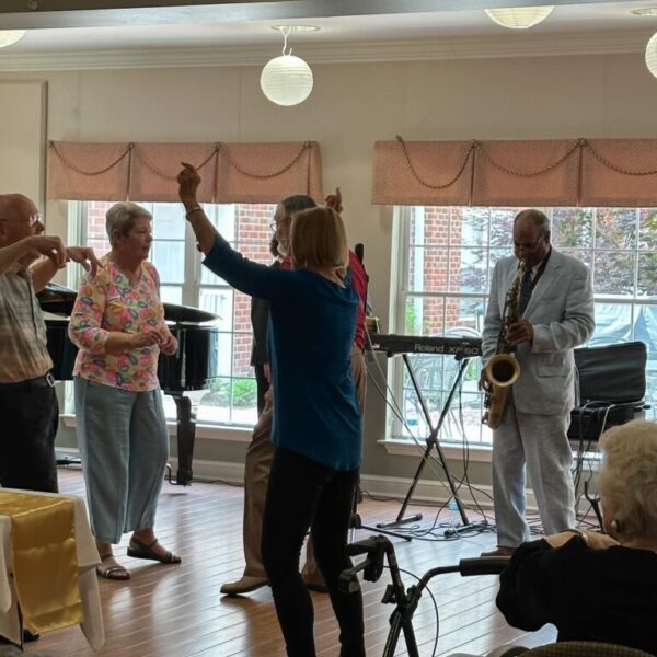 Residents on the dance floor dancing together