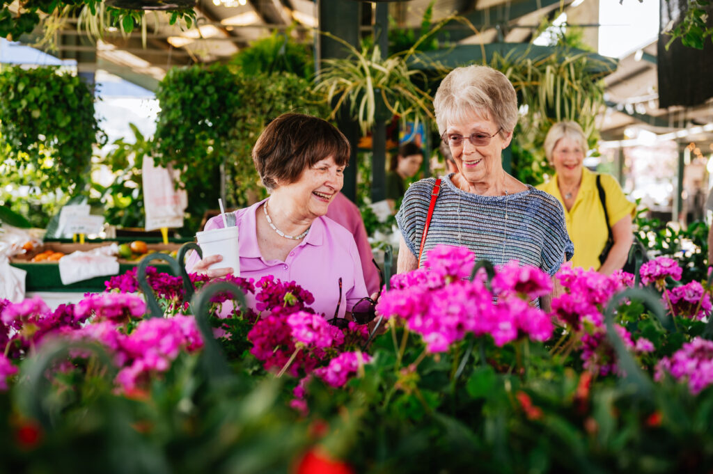 Women browsing at a flower store