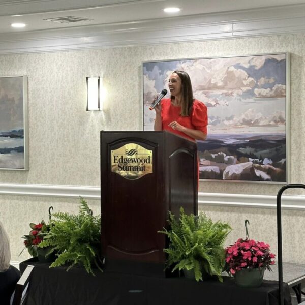 Author Joy Calleway giving a speech at the Mother's Day luncheon