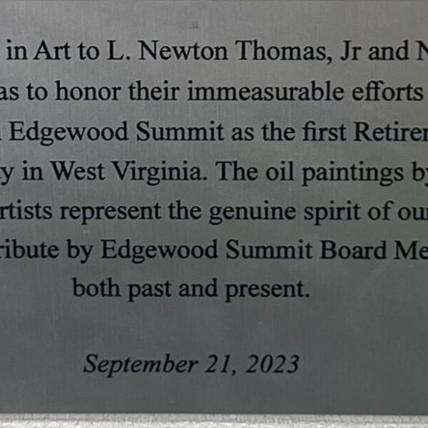 A plaque that tributes to Newton Thomas Jr. and Nancy Thomas