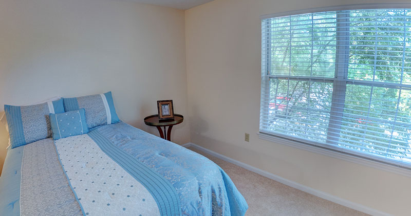 Sample apartment bedroom for assisted living residents