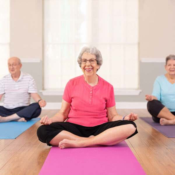 Residents taking a group exercise class together