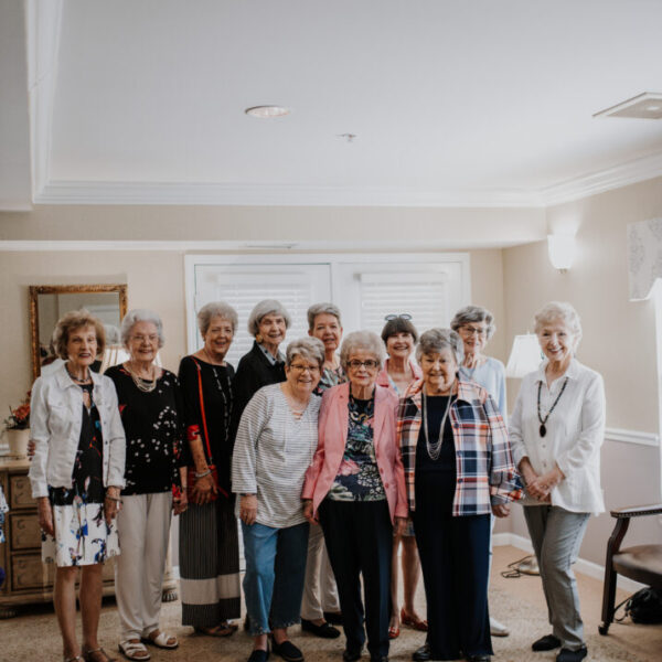 Residents who participated in the fashion show posing together for a picture