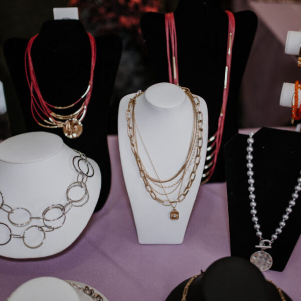 A table selling womens jewelry at the ladies fashion show