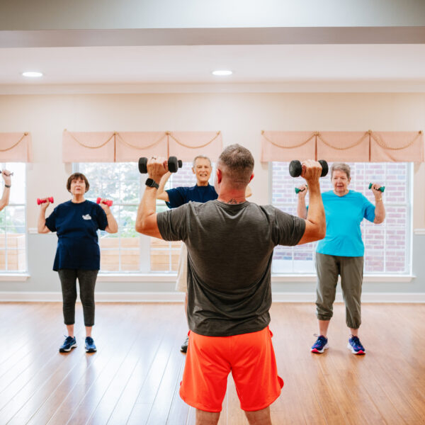 A fitness instructor conducting a group class