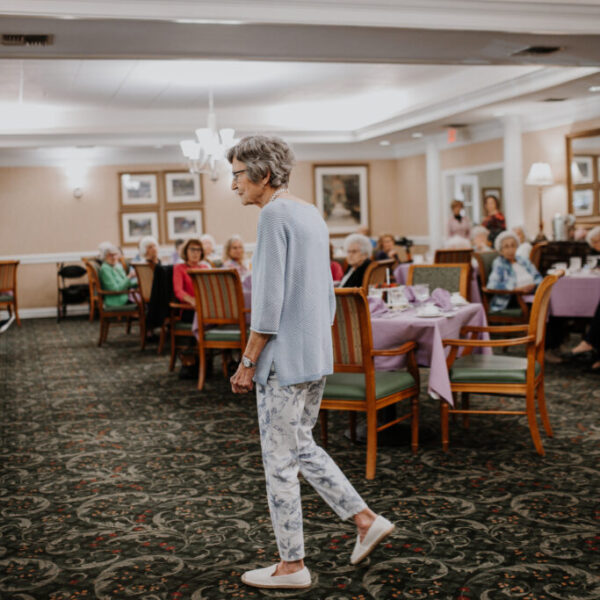 Resident looking at the different displays at the fashion show