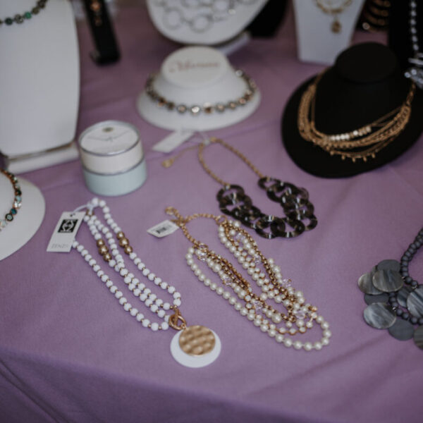 Necklaces and other jewelry displayed for the fashion show