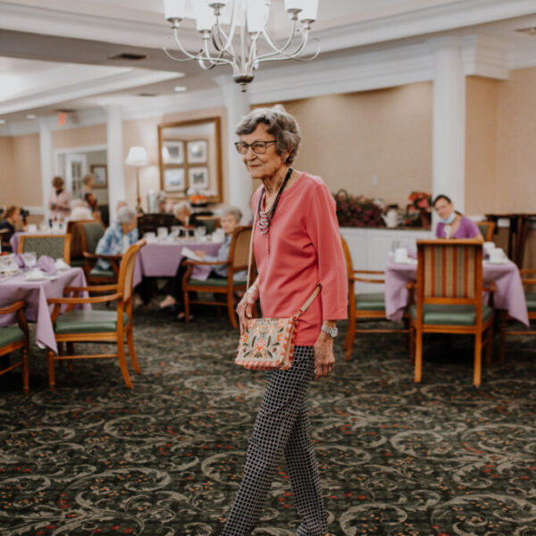 Resident admiring the work of the fashion show