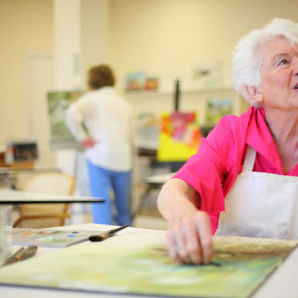 Residents completing artwork in the art studio